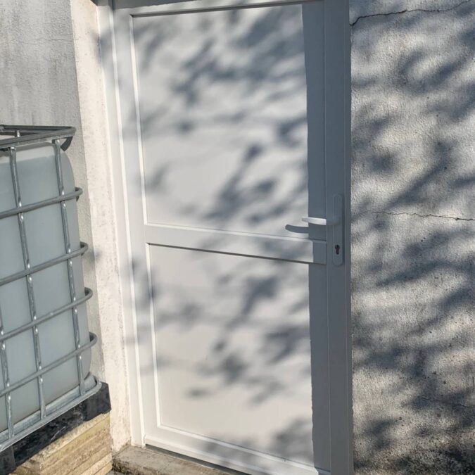 Pose de porte de service Audincourt